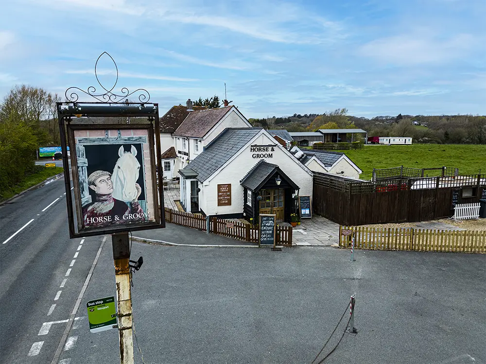 the main entrance from the car park to the horse and groom taken with a drone
