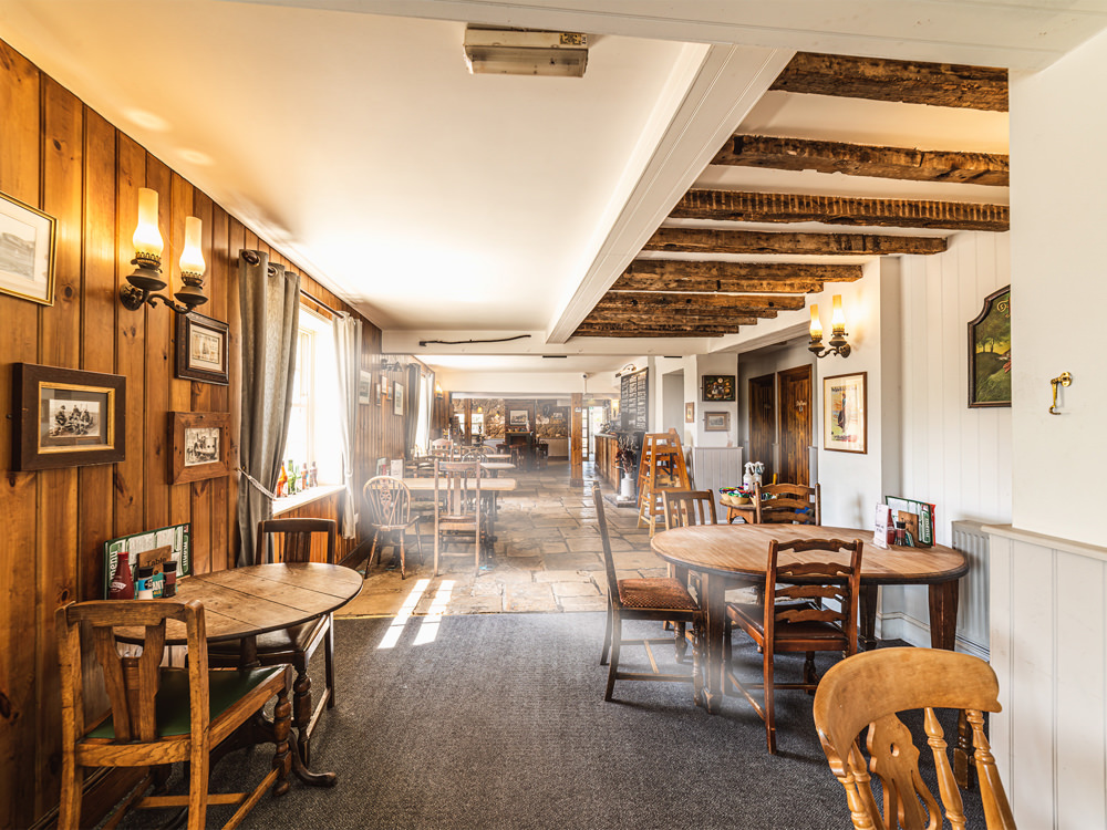 halfway down the bar area at the horse and groom